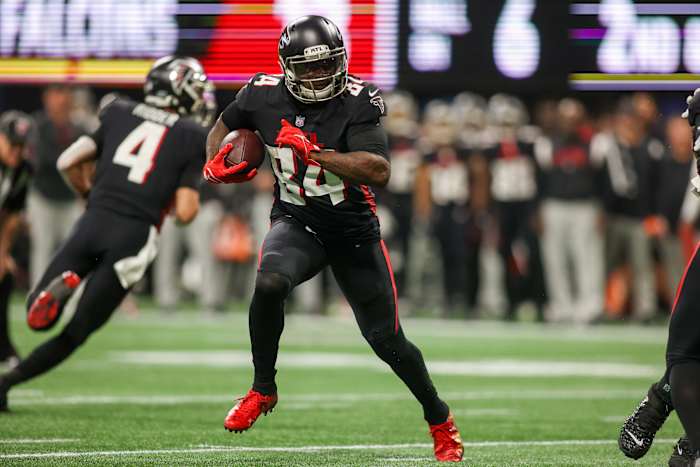 Jan 8, 2023; Atlanta, Georgia, USA; Atlanta Falcons running back Cordarrelle Patterson (84) runs the ball against the Tampa Bay Buccaneers in the second half at Mercedes-Benz Stadium.